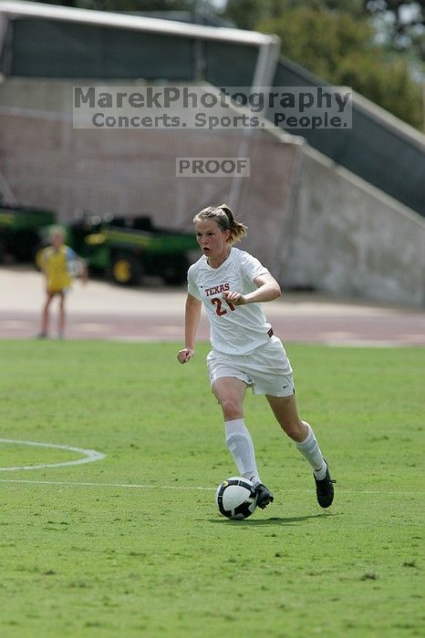 UT junior Emily Anderson (#21, Forward).  The Uniiversity of Texas women's soccer team won 2-1 against the Iowa State Cyclones Sunday afternoon, October 5, 2008.

Filename: SRM_20081005_12135491.jpg
Aperture: f/5.6
Shutter Speed: 1/2000
Body: Canon EOS-1D Mark II
Lens: Canon EF 300mm f/2.8 L IS