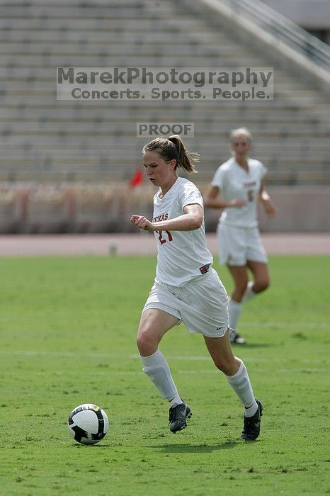 UT junior Emily Anderson (#21, Forward).  The Uniiversity of Texas women's soccer team won 2-1 against the Iowa State Cyclones Sunday afternoon, October 5, 2008.

Filename: SRM_20081005_12135697.jpg
Aperture: f/5.6
Shutter Speed: 1/2500
Body: Canon EOS-1D Mark II
Lens: Canon EF 300mm f/2.8 L IS