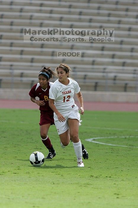 UT sophomore Alisha Ortiz (#12, Forward).  The University of Texas women's soccer team won 2-1 against the Iowa State Cyclones Sunday afternoon, October 5, 2008.

Filename: SRM_20081005_12171437.jpg
Aperture: f/5.6
Shutter Speed: 1/1600
Body: Canon EOS-1D Mark II
Lens: Canon EF 300mm f/2.8 L IS