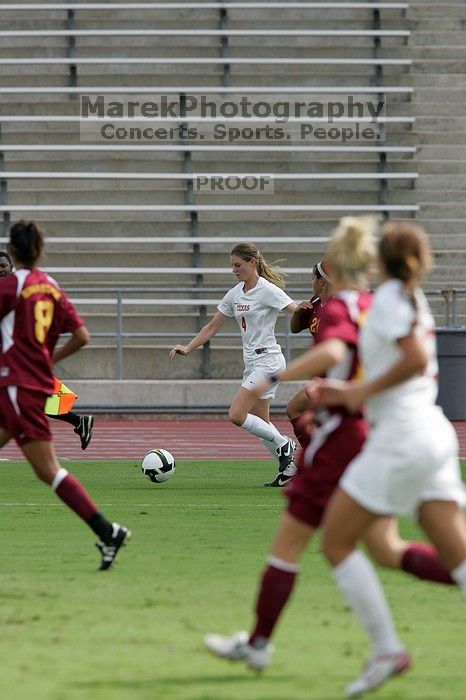 UT senior Jill Gilbeau (#4, Defender and Midfielder).  The University of Texas women's soccer team won 2-1 against the Iowa State Cyclones Sunday afternoon, October 5, 2008.

Filename: SRM_20081005_12172644.jpg
Aperture: f/5.6
Shutter Speed: 1/1600
Body: Canon EOS-1D Mark II
Lens: Canon EF 300mm f/2.8 L IS