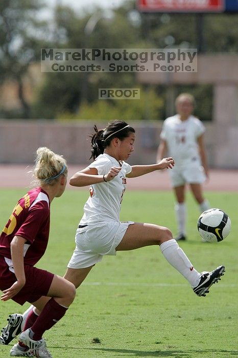 UT freshman Amanda Lisberger (#13, Midfielder).  The University of Texas women's soccer team won 2-1 against the Iowa State Cyclones Sunday afternoon, October 5, 2008.

Filename: SRM_20081005_12201874.jpg
Aperture: f/5.6
Shutter Speed: 1/2000
Body: Canon EOS-1D Mark II
Lens: Canon EF 300mm f/2.8 L IS