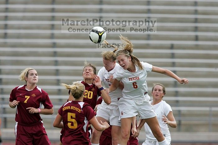 UT freshman Lucy Keith (#6, Midfielder) and UT freshman Courtney Goodson (#7, Forward and Midfielder) fight for the header as UT senior Kasey Moore (#14, Defender) watches.  Keith makes contact, which was an assist to UT junior Emily Anderson (#21, Forward).  The University of Texas women's soccer team won 2-1 against the Iowa State Cyclones Sunday afternoon, October 5, 2008.

Filename: SRM_20081005_12210085.jpg
Aperture: f/5.0
Shutter Speed: 1/1600
Body: Canon EOS-1D Mark II
Lens: Canon EF 300mm f/2.8 L IS