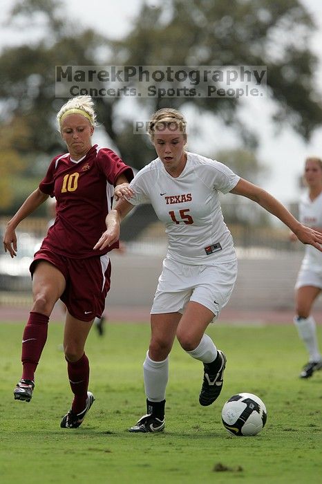 UT freshman Kylie Doniak (#15, Midfielder).  The University of Texas women's soccer team won 2-1 against the Iowa State Cyclones Sunday afternoon, October 5, 2008.

Filename: SRM_20081005_12260866.jpg
Aperture: f/5.6
Shutter Speed: 1/2000
Body: Canon EOS-1D Mark II
Lens: Canon EF 300mm f/2.8 L IS