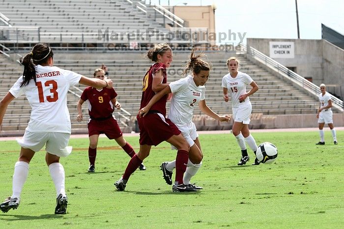 UT sophomore Kirsten Birkhold (#2, Forward and Midfielder) waits for the header.  The University of Texas women's soccer team won 2-1 against the Iowa State Cyclones Sunday afternoon, October 5, 2008.

Filename: SRM_20081005_12310850.jpg
Aperture: f/5.6
Shutter Speed: 1/1600
Body: Canon EOS 20D
Lens: Canon EF 80-200mm f/2.8 L