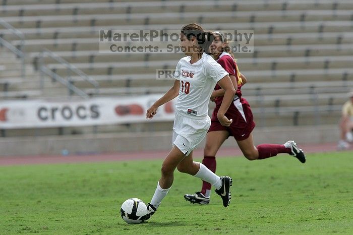 UT senior Stephanie Logterman (#10, Defender) runs with the ball.  The University of Texas women's soccer team won 2-1 against the Iowa State Cyclones Sunday afternoon, October 5, 2008.

Filename: SRM_20081005_12322819.jpg
Aperture: f/5.6
Shutter Speed: 1/2000
Body: Canon EOS-1D Mark II
Lens: Canon EF 300mm f/2.8 L IS