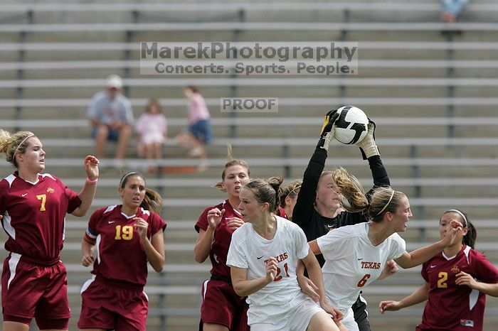 UT junior Emily Anderson (#21, Forward) and UT freshman Lucy Keith (#6, Midfielder) fight for the header with the keeper, as UT junior Stephanie Gibson (#22, Defense and Forward) watches.  The University of Texas women's soccer team won 2-1 against the Iowa State Cyclones Sunday afternoon, October 5, 2008.

Filename: SRM_20081005_12420624.jpg
Aperture: f/5.6
Shutter Speed: 1/1600
Body: Canon EOS-1D Mark II
Lens: Canon EF 300mm f/2.8 L IS