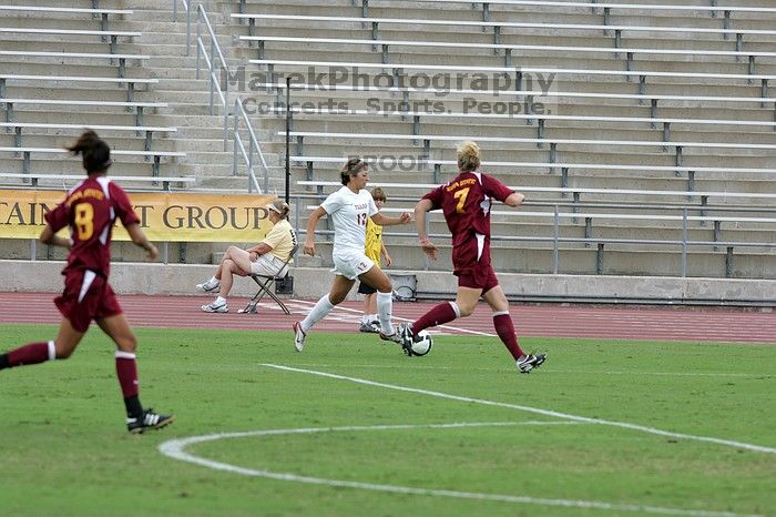 UT sophomore Alisha Ortiz (#12, Forward) in the second half.  The University of Texas women's soccer team won 2-1 against the Iowa State Cyclones Sunday afternoon, October 5, 2008.

Filename: SRM_20081005_13014675.jpg
Aperture: f/5.6
Shutter Speed: 1/1250
Body: Canon EOS-1D Mark II
Lens: Canon EF 300mm f/2.8 L IS