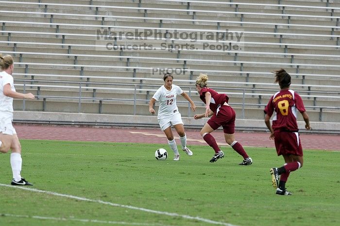 UT sophomore Alisha Ortiz (#12, Forward) in the second half.  The University of Texas women's soccer team won 2-1 against the Iowa State Cyclones Sunday afternoon, October 5, 2008.

Filename: SRM_20081005_13014882.jpg
Aperture: f/5.6
Shutter Speed: 1/1250
Body: Canon EOS-1D Mark II
Lens: Canon EF 300mm f/2.8 L IS