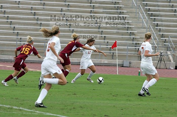 UT sophomore Alisha Ortiz (#12, Forward) in the second half.  The University of Texas women's soccer team won 2-1 against the Iowa State Cyclones Sunday afternoon, October 5, 2008.

Filename: SRM_20081005_13015088.jpg
Aperture: f/5.6
Shutter Speed: 1/1600
Body: Canon EOS-1D Mark II
Lens: Canon EF 300mm f/2.8 L IS