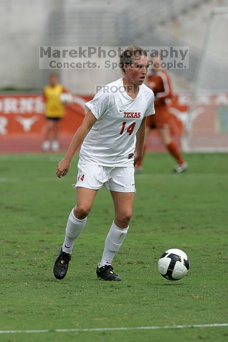 UT senior Kasey Moore (#14, Defender) in the second half.  The University of Texas women's soccer team won 2-1 against the Iowa State Cyclones Sunday afternoon, October 5, 2008.

Filename: SRM_20081005_13092433.jpg
Aperture: f/5.6
Shutter Speed: 1/2000
Body: Canon EOS-1D Mark II
Lens: Canon EF 300mm f/2.8 L IS