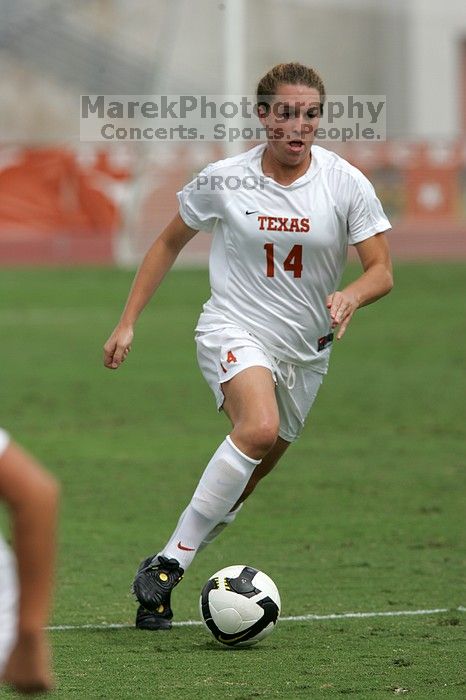 UT senior Kasey Moore (#14, Defender) in the second half.  The University of Texas women's soccer team won 2-1 against the Iowa State Cyclones Sunday afternoon, October 5, 2008.

Filename: SRM_20081005_13092841.jpg
Aperture: f/5.6
Shutter Speed: 1/2500
Body: Canon EOS-1D Mark II
Lens: Canon EF 300mm f/2.8 L IS