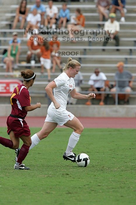 UT freshman Courtney Goodson (#7, Forward and Midfielder) in the second half.  The University of Texas women's soccer team won 2-1 against the Iowa State Cyclones Sunday afternoon, October 5, 2008.

Filename: SRM_20081005_13110863.jpg
Aperture: f/5.6
Shutter Speed: 1/1250
Body: Canon EOS-1D Mark II
Lens: Canon EF 300mm f/2.8 L IS