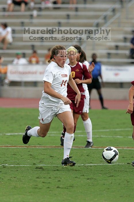 UT senior Kasey Moore (#14, Defender) takes the ball upfield in the second half.  The University of Texas women's soccer team won 2-1 against the Iowa State Cyclones Sunday afternoon, October 5, 2008.

Filename: SRM_20081005_13175266.jpg
Aperture: f/5.6
Shutter Speed: 1/1250
Body: Canon EOS-1D Mark II
Lens: Canon EF 300mm f/2.8 L IS