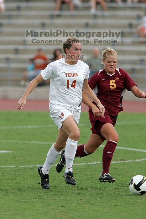 UT senior Kasey Moore (#14, Defender) takes the ball upfield in the second half.  The University of Texas women's soccer team won 2-1 against the Iowa State Cyclones Sunday afternoon, October 5, 2008.

Filename: SRM_20081005_13175471.jpg
Aperture: f/5.6
Shutter Speed: 1/1250
Body: Canon EOS-1D Mark II
Lens: Canon EF 300mm f/2.8 L IS