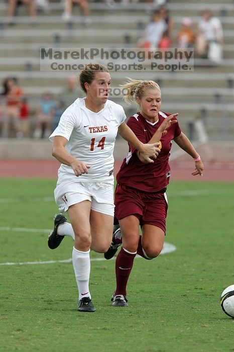 UT senior Kasey Moore (#14, Defender) takes the ball upfield in the second half.  The University of Texas women's soccer team won 2-1 against the Iowa State Cyclones Sunday afternoon, October 5, 2008.

Filename: SRM_20081005_13175472.jpg
Aperture: f/5.6
Shutter Speed: 1/1250
Body: Canon EOS-1D Mark II
Lens: Canon EF 300mm f/2.8 L IS