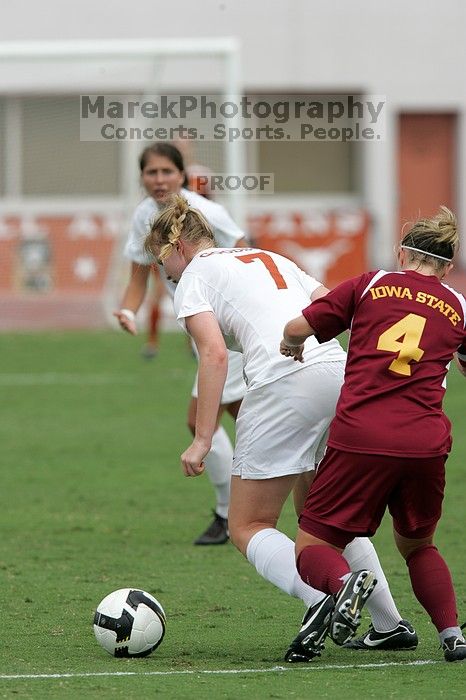 UT freshman Courtney Goodson (#7, Forward and Midfielder) in the second half.  The University of Texas women's soccer team won 2-1 against the Iowa State Cyclones Sunday afternoon, October 5, 2008.

Filename: SRM_20081005_13210462.jpg
Aperture: f/5.6
Shutter Speed: 1/2000
Body: Canon EOS-1D Mark II
Lens: Canon EF 300mm f/2.8 L IS