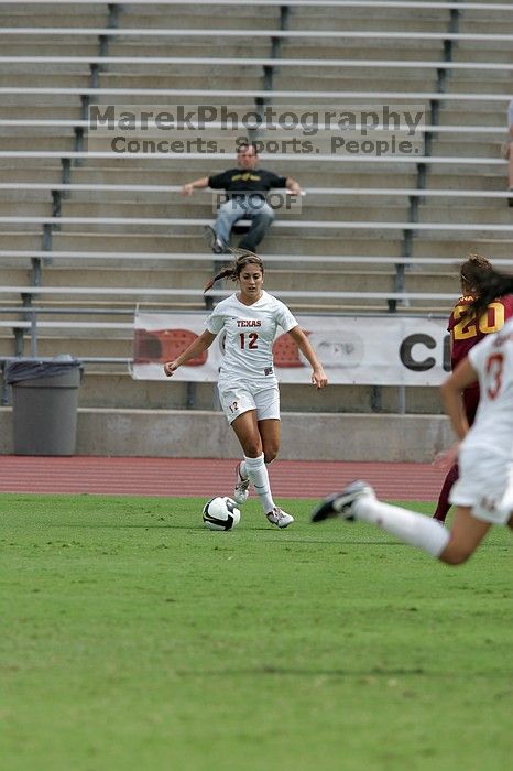 UT sophomore Alisha Ortiz (#12, Forward) in the second half.  The University of Texas women's soccer team won 2-1 against the Iowa State Cyclones Sunday afternoon, October 5, 2008.

Filename: SRM_20081005_13231610.jpg
Aperture: f/5.6
Shutter Speed: 1/2000
Body: Canon EOS-1D Mark II
Lens: Canon EF 300mm f/2.8 L IS