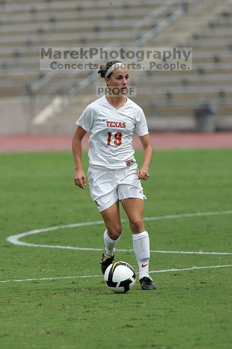 UT sophomore Erica Campanelli (#19, Defender) in the second half.  The University of Texas women's soccer team won 2-1 against the Iowa State Cyclones Sunday afternoon, October 5, 2008.

Filename: SRM_20081005_13233635.jpg
Aperture: f/5.6
Shutter Speed: 1/2000
Body: Canon EOS-1D Mark II
Lens: Canon EF 300mm f/2.8 L IS