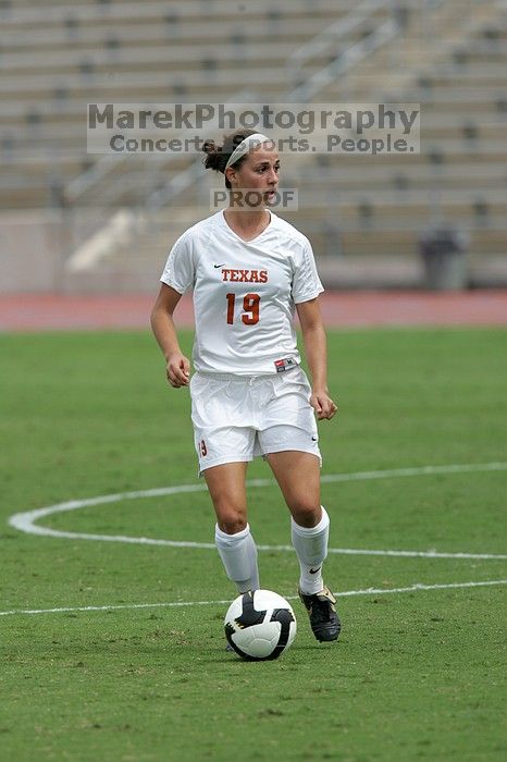 UT sophomore Erica Campanelli (#19, Defender) in the second half.  The University of Texas women's soccer team won 2-1 against the Iowa State Cyclones Sunday afternoon, October 5, 2008.

Filename: SRM_20081005_13233637.jpg
Aperture: f/5.6
Shutter Speed: 1/2000
Body: Canon EOS-1D Mark II
Lens: Canon EF 300mm f/2.8 L IS