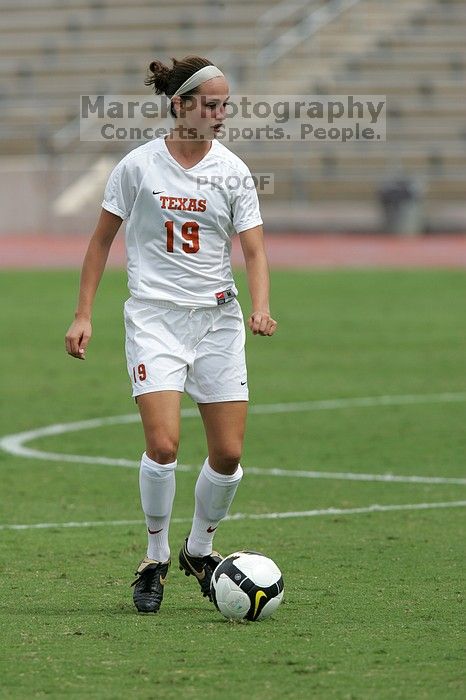 UT sophomore Erica Campanelli (#19, Defender) in the second half.  The University of Texas women's soccer team won 2-1 against the Iowa State Cyclones Sunday afternoon, October 5, 2008.

Filename: SRM_20081005_13233840.jpg
Aperture: f/5.6
Shutter Speed: 1/2000
Body: Canon EOS-1D Mark II
Lens: Canon EF 300mm f/2.8 L IS