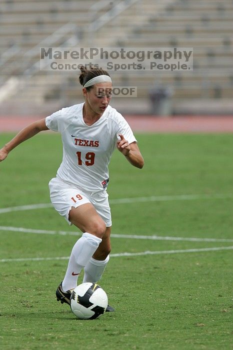 UT sophomore Erica Campanelli (#19, Defender) in the second half.  The University of Texas women's soccer team won 2-1 against the Iowa State Cyclones Sunday afternoon, October 5, 2008.

Filename: SRM_20081005_13233843.jpg
Aperture: f/5.6
Shutter Speed: 1/2000
Body: Canon EOS-1D Mark II
Lens: Canon EF 300mm f/2.8 L IS