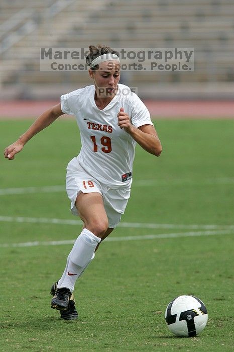 UT sophomore Erica Campanelli (#19, Defender) in the second half.  The University of Texas women's soccer team won 2-1 against the Iowa State Cyclones Sunday afternoon, October 5, 2008.

Filename: SRM_20081005_13234047.jpg
Aperture: f/5.6
Shutter Speed: 1/2000
Body: Canon EOS-1D Mark II
Lens: Canon EF 300mm f/2.8 L IS