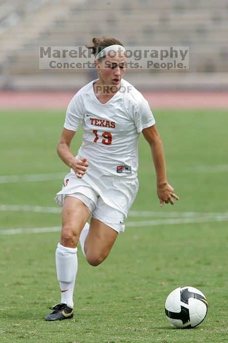 UT sophomore Erica Campanelli (#19, Defender) in the second half.  The University of Texas women's soccer team won 2-1 against the Iowa State Cyclones Sunday afternoon, October 5, 2008.

Filename: SRM_20081005_13234048.jpg
Aperture: f/5.6
Shutter Speed: 1/1250
Body: Canon EOS-1D Mark II
Lens: Canon EF 300mm f/2.8 L IS