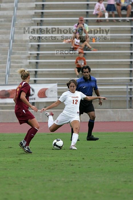 UT sophomore Alisha Ortiz (#12, Forward) in the second half.  The University of Texas women's soccer team won 2-1 against the Iowa State Cyclones Sunday afternoon, October 5, 2008.

Filename: SRM_20081005_13244667.jpg
Aperture: f/5.6
Shutter Speed: 1/1600
Body: Canon EOS-1D Mark II
Lens: Canon EF 300mm f/2.8 L IS