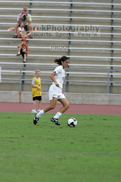 UT senior Stephanie Logterman (#10, Defender) in the second half.  The University of Texas women's soccer team won 2-1 against the Iowa State Cyclones Sunday afternoon, October 5, 2008.

Filename: SRM_20081005_13253491.jpg
Aperture: f/5.6
Shutter Speed: 1/1600
Body: Canon EOS-1D Mark II
Lens: Canon EF 300mm f/2.8 L IS