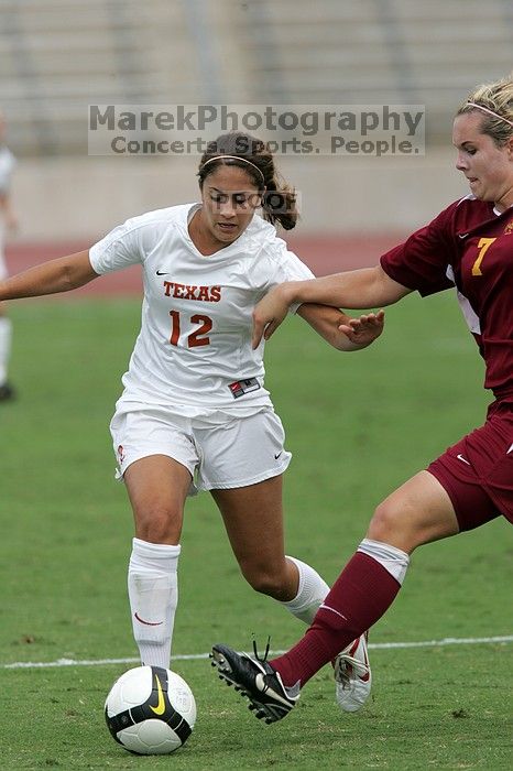 UT sophomore Alisha Ortiz (#12, Forward) in the second half.  The University of Texas women's soccer team won 2-1 against the Iowa State Cyclones Sunday afternoon, October 5, 2008.

Filename: SRM_20081005_13262634.jpg
Aperture: f/5.6
Shutter Speed: 1/1600
Body: Canon EOS-1D Mark II
Lens: Canon EF 300mm f/2.8 L IS