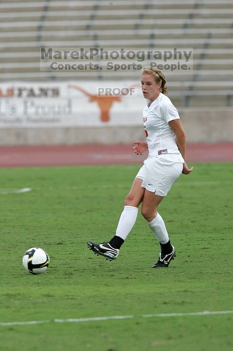 UT freshman Kylie Doniak (#15, Midfielder) in the second half.  The University of Texas women's soccer team won 2-1 against the Iowa State Cyclones Sunday afternoon, October 5, 2008.

Filename: SRM_20081005_13285897.jpg
Aperture: f/5.6
Shutter Speed: 1/1250
Body: Canon EOS-1D Mark II
Lens: Canon EF 300mm f/2.8 L IS