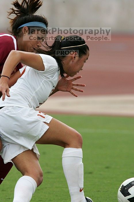 UT freshman Amanda Lisberger (#13, Midfielder) in the second half.  The University of Texas women's soccer team won 2-1 against the Iowa State Cyclones Sunday afternoon, October 5, 2008.

Filename: SRM_20081005_13311226.jpg
Aperture: f/5.6
Shutter Speed: 1/1250
Body: Canon EOS-1D Mark II
Lens: Canon EF 300mm f/2.8 L IS