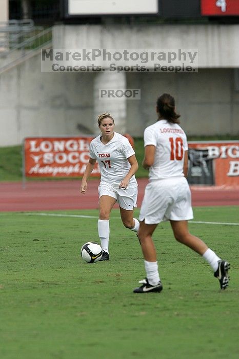 UT sophomore Kate Nicholson (#17, Forward and Midfielder) in the second half.  The University of Texas women's soccer team won 2-1 against the Iowa State Cyclones Sunday afternoon, October 5, 2008.

Filename: SRM_20081005_13314033.jpg
Aperture: f/5.6
Shutter Speed: 1/1600
Body: Canon EOS-1D Mark II
Lens: Canon EF 300mm f/2.8 L IS