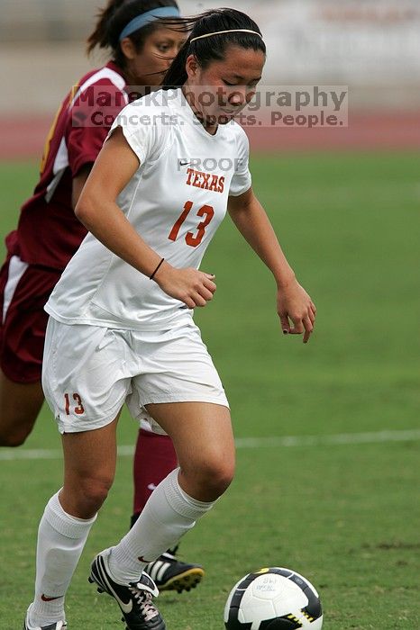 UT freshman Amanda Lisberger (#13, Midfielder) in the second half.  The University of Texas women's soccer team won 2-1 against the Iowa State Cyclones Sunday afternoon, October 5, 2008.

Filename: SRM_20081005_13315238.jpg
Aperture: f/5.6
Shutter Speed: 1/2000
Body: Canon EOS-1D Mark II
Lens: Canon EF 300mm f/2.8 L IS