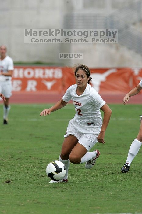 UT sophomore Alisha Ortiz (#12, Forward) in the second half.  The University of Texas women's soccer team won 2-1 against the Iowa State Cyclones Sunday afternoon, October 5, 2008.

Filename: SRM_20081005_13330051.jpg
Aperture: f/5.6
Shutter Speed: 1/1600
Body: Canon EOS-1D Mark II
Lens: Canon EF 300mm f/2.8 L IS