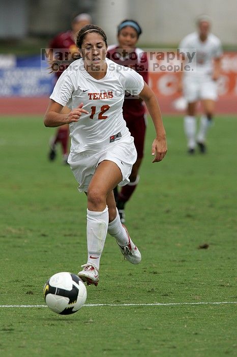 UT sophomore Alisha Ortiz (#12, Forward) in the second half.  The University of Texas women's soccer team won 2-1 against the Iowa State Cyclones Sunday afternoon, October 5, 2008.

Filename: SRM_20081005_13330256.jpg
Aperture: f/5.6
Shutter Speed: 1/1600
Body: Canon EOS-1D Mark II
Lens: Canon EF 300mm f/2.8 L IS