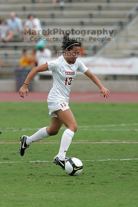 UT freshman Amanda Lisberger (#13, Midfielder) in the second half.  The University of Texas women's soccer team won 2-1 against the Iowa State Cyclones Sunday afternoon, October 5, 2008.

Filename: SRM_20081005_13340075.jpg
Aperture: f/5.6
Shutter Speed: 1/1600
Body: Canon EOS-1D Mark II
Lens: Canon EF 300mm f/2.8 L IS