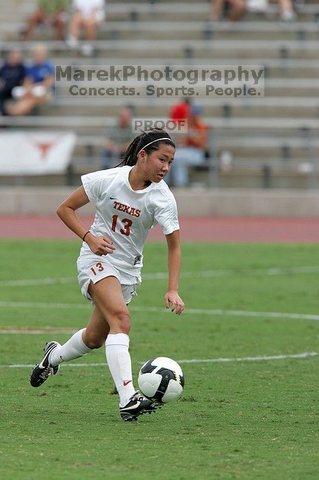 UT freshman Amanda Lisberger (#13, Midfielder) in the second half.  The University of Texas women's soccer team won 2-1 against the Iowa State Cyclones Sunday afternoon, October 5, 2008.

Filename: SRM_20081005_13340078.jpg
Aperture: f/5.6
Shutter Speed: 1/1250
Body: Canon EOS-1D Mark II
Lens: Canon EF 300mm f/2.8 L IS