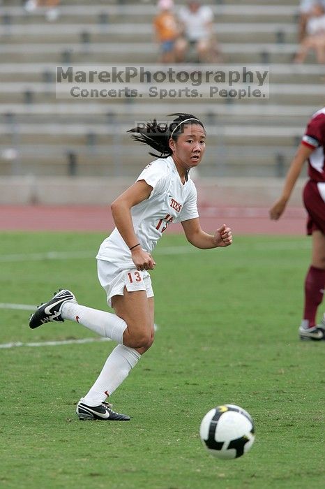 UT freshman Amanda Lisberger (#13, Midfielder) in the second half.  The University of Texas women's soccer team won 2-1 against the Iowa State Cyclones Sunday afternoon, October 5, 2008.

Filename: SRM_20081005_13340080.jpg
Aperture: f/5.6
Shutter Speed: 1/1250
Body: Canon EOS-1D Mark II
Lens: Canon EF 300mm f/2.8 L IS