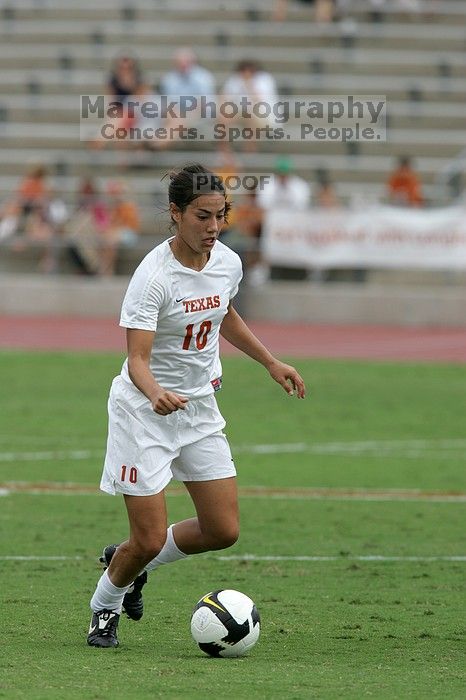 UT senior Stephanie Logterman (#10, Defender) in the second half.  The University of Texas women's soccer team won 2-1 against the Iowa State Cyclones Sunday afternoon, October 5, 2008.

Filename: SRM_20081005_13340485.jpg
Aperture: f/5.6
Shutter Speed: 1/1600
Body: Canon EOS-1D Mark II
Lens: Canon EF 300mm f/2.8 L IS