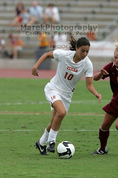 UT senior Stephanie Logterman (#10, Defender) in the second half.  The University of Texas women's soccer team won 2-1 against the Iowa State Cyclones Sunday afternoon, October 5, 2008.

Filename: SRM_20081005_13340487.jpg
Aperture: f/5.6
Shutter Speed: 1/1600
Body: Canon EOS-1D Mark II
Lens: Canon EF 300mm f/2.8 L IS