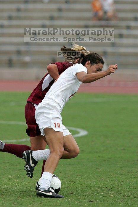 UT senior Stephanie Logterman (#10, Defender) in the second half.  The University of Texas women's soccer team won 2-1 against the Iowa State Cyclones Sunday afternoon, October 5, 2008.

Filename: SRM_20081005_13340692.jpg
Aperture: f/5.6
Shutter Speed: 1/1600
Body: Canon EOS-1D Mark II
Lens: Canon EF 300mm f/2.8 L IS