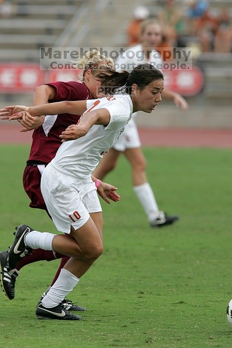 UT senior Stephanie Logterman (#10, Defender) in the second half.  The University of Texas women's soccer team won 2-1 against the Iowa State Cyclones Sunday afternoon, October 5, 2008.

Filename: SRM_20081005_13340898.jpg
Aperture: f/5.6
Shutter Speed: 1/1600
Body: Canon EOS-1D Mark II
Lens: Canon EF 300mm f/2.8 L IS