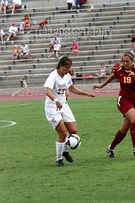 UT senior Courtney Gaines (#23, Midfielder) in the second half.  The University of Texas women's soccer team won 2-1 against the Iowa State Cyclones Sunday afternoon, October 5, 2008.

Filename: SRM_20081005_13343211.jpg
Aperture: f/5.6
Shutter Speed: 1/1000
Body: Canon EOS 20D
Lens: Canon EF 80-200mm f/2.8 L