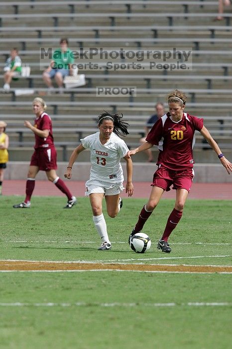 UT freshman Amanda Lisberger (#13, Midfielder) in the second half.  The University of Texas women's soccer team won 2-1 against the Iowa State Cyclones Sunday afternoon, October 5, 2008.

Filename: SRM_20081005_13373433.jpg
Aperture: f/5.6
Shutter Speed: 1/2000
Body: Canon EOS-1D Mark II
Lens: Canon EF 300mm f/2.8 L IS