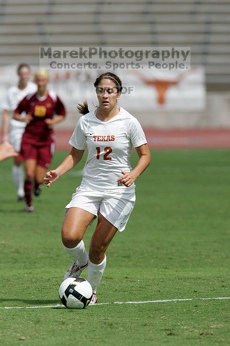 UT sophomore Alisha Ortiz (#12, Forward) in the second half.  The University of Texas women's soccer team won 2-1 against the Iowa State Cyclones Sunday afternoon, October 5, 2008.

Filename: SRM_20081005_13424669.jpg
Aperture: f/5.6
Shutter Speed: 1/3200
Body: Canon EOS-1D Mark II
Lens: Canon EF 300mm f/2.8 L IS