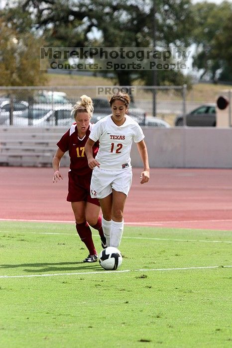 UT sophomore Alisha Ortiz (#12, Forward) in the second half.  The University of Texas women's soccer team won 2-1 against the Iowa State Cyclones Sunday afternoon, October 5, 2008.

Filename: SRM_20081005_13430829.jpg
Aperture: f/5.0
Shutter Speed: 1/2000
Body: Canon EOS 20D
Lens: Canon EF 80-200mm f/2.8 L