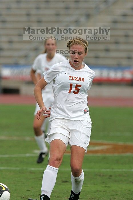 UT freshman Kylie Doniak (#15, Midfielder) in the second half.  The University of Texas women's soccer team won 2-1 against the Iowa State Cyclones Sunday afternoon, October 5, 2008.

Filename: SRM_20081005_13450481.jpg
Aperture: f/5.6
Shutter Speed: 1/2000
Body: Canon EOS-1D Mark II
Lens: Canon EF 300mm f/2.8 L IS