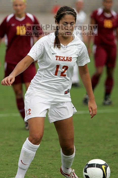 UT sophomore Alisha Ortiz (#12, Forward) in the second half.  The University of Texas women's soccer team won 2-1 against the Iowa State Cyclones Sunday afternoon, October 5, 2008.

Filename: SRM_20081005_13450684.jpg
Aperture: f/5.6
Shutter Speed: 1/2000
Body: Canon EOS-1D Mark II
Lens: Canon EF 300mm f/2.8 L IS