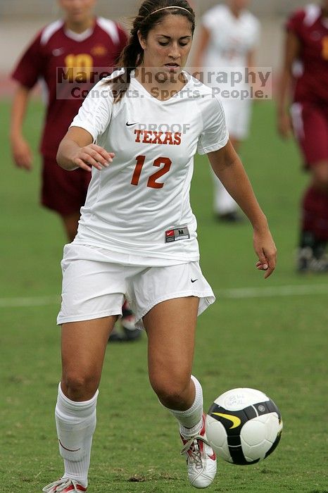 UT sophomore Alisha Ortiz (#12, Forward) in the second half.  The University of Texas women's soccer team won 2-1 against the Iowa State Cyclones Sunday afternoon, October 5, 2008.

Filename: SRM_20081005_13450685.jpg
Aperture: f/5.6
Shutter Speed: 1/2000
Body: Canon EOS-1D Mark II
Lens: Canon EF 300mm f/2.8 L IS